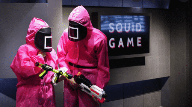 Binance Investigates, squid game, scammers, exchange